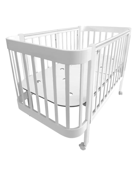 Кровать детская Indigo Italiano Baby продольный маятник на колесах белый-белый