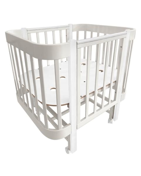 Кровать детская Indigo Italiano Baby продольный маятник на колесах кашемир-белый