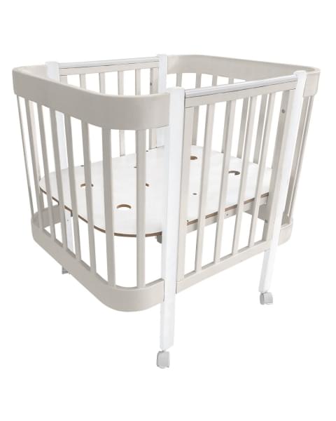 Кровать детская Indigo Italiano Baby продольный маятник на колесах кашемир-белый