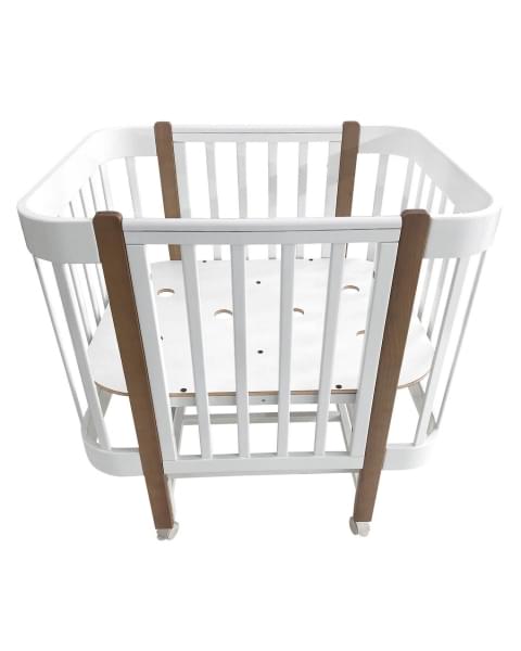 Кровать детская Indigo Italiano Baby продольный маятник на колесах белый-натуральный