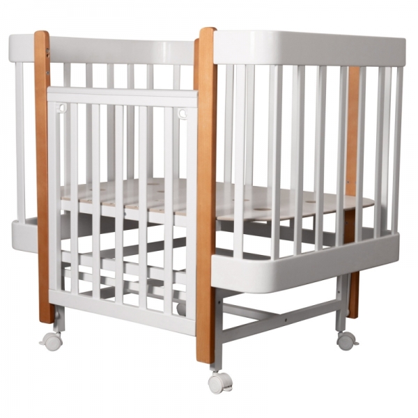 Кровать детская INDIGO Tiny (ложе 100х70, закругленные углы, продольный маятник + колеса) массив б (белый-натуральный)